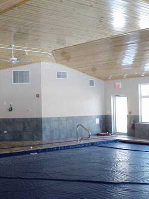 Indoor pool with pool cover