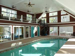 Residential pool room with properly enclosed surrounding spaces